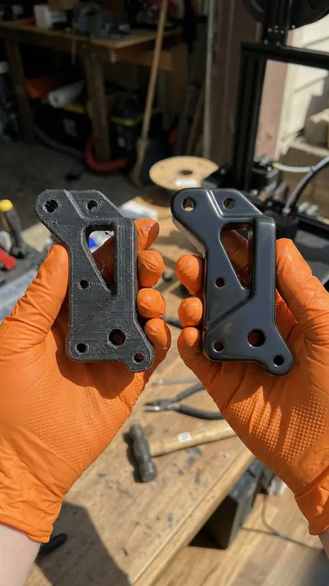 A curved structural printed part before and after surface finishing